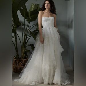 NWT Size 12 Wedding Dress. Never worn. Not altered